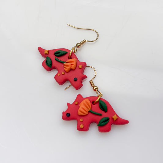 RED ORANGE POPPY DINO EARRINGS (TRICERATOPS)