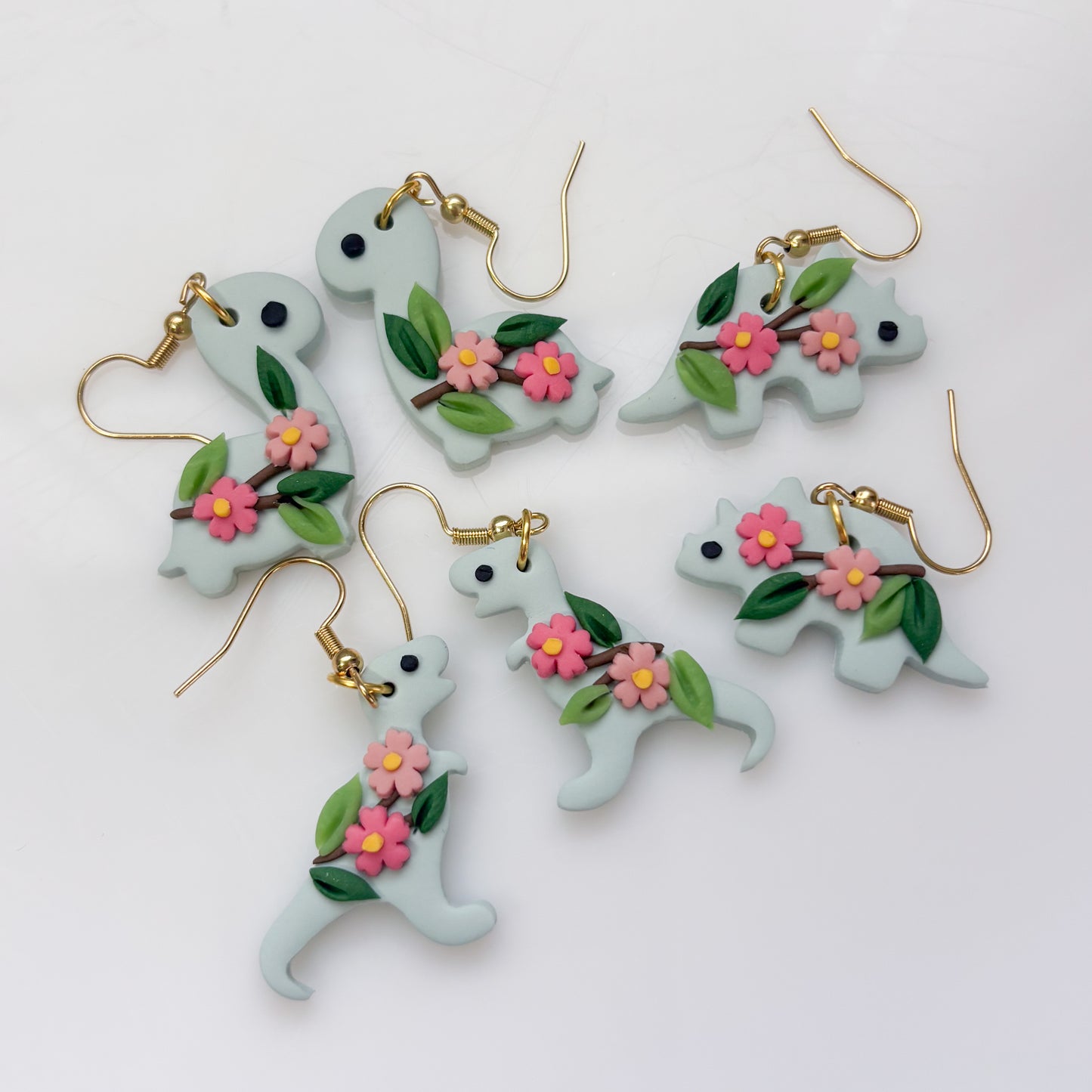 GLACIER BLUE CHERRY BLOSSOM DINO EARRINGS (T REX)