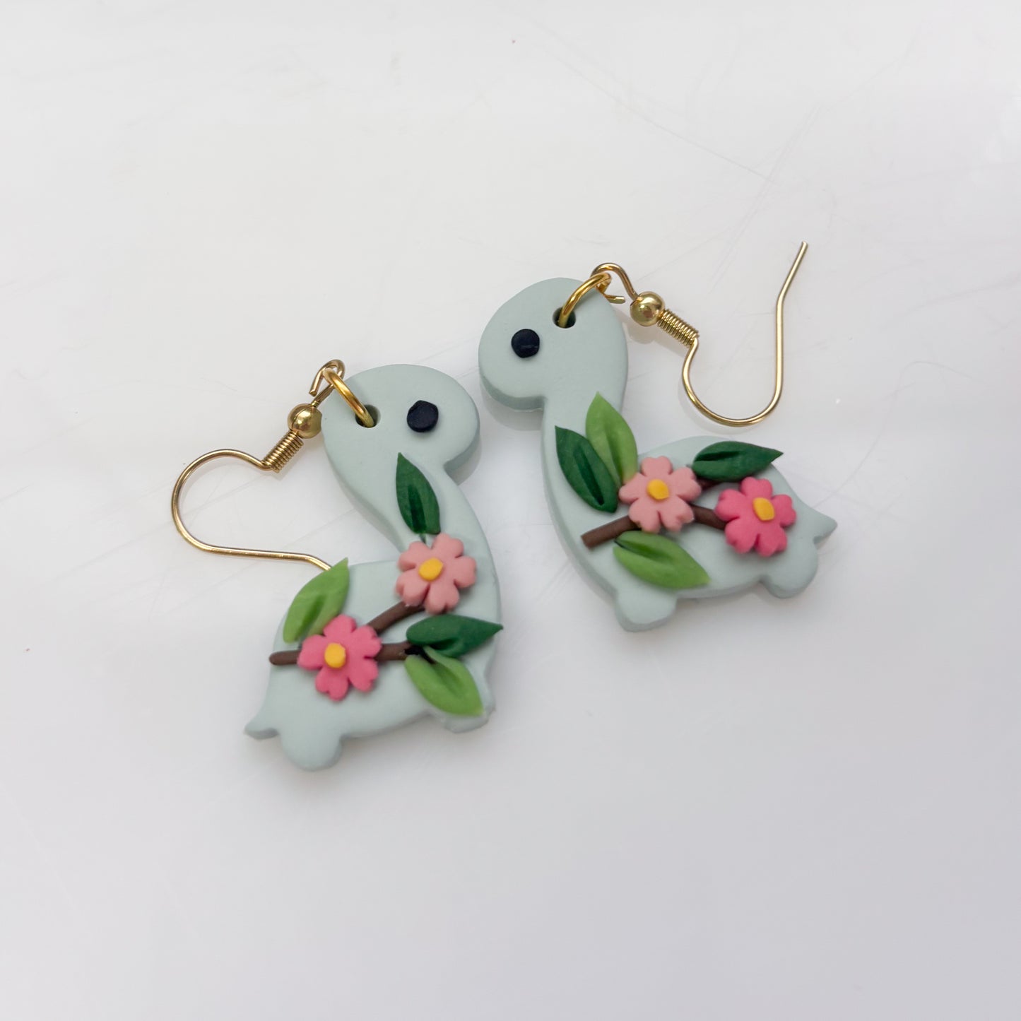 GLACIER BLUE CHERRY BLOSSOM DINO EARRINGS (BRONTO)