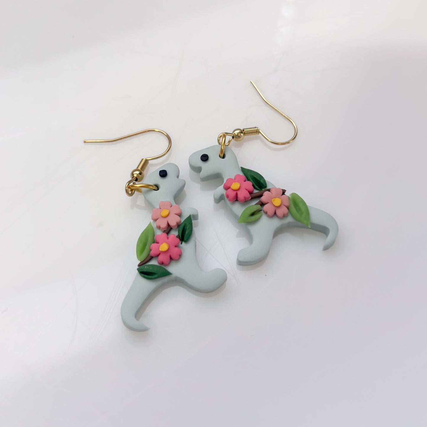 GLACIER BLUE CHERRY BLOSSOM DINO EARRINGS (T REX)