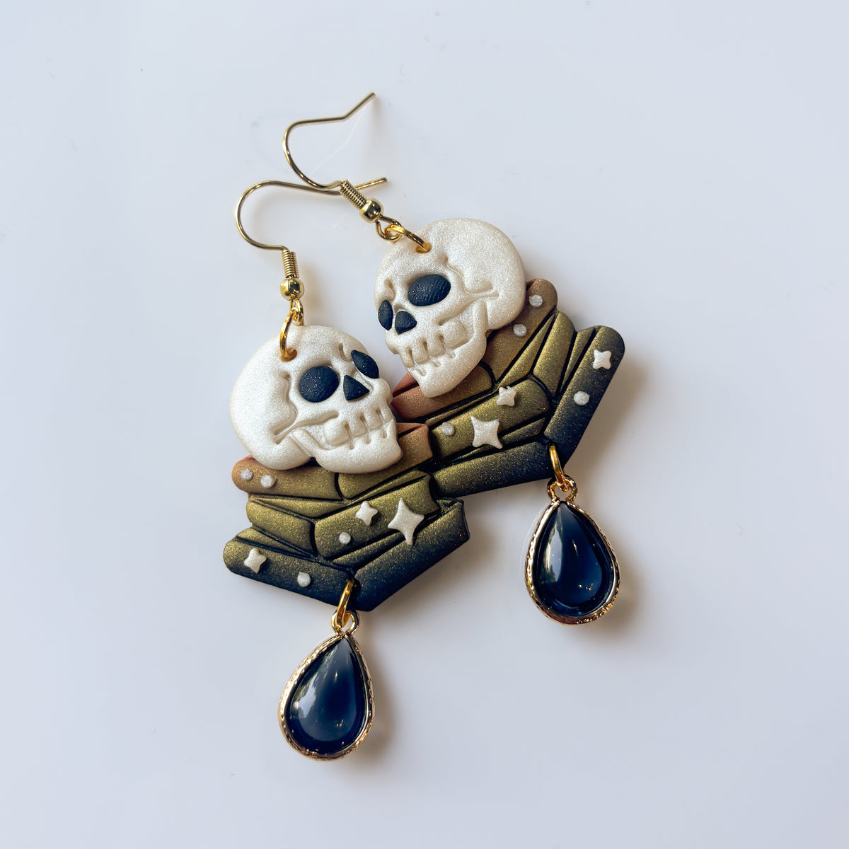 SKULLS ON BOOKS EARRINGS