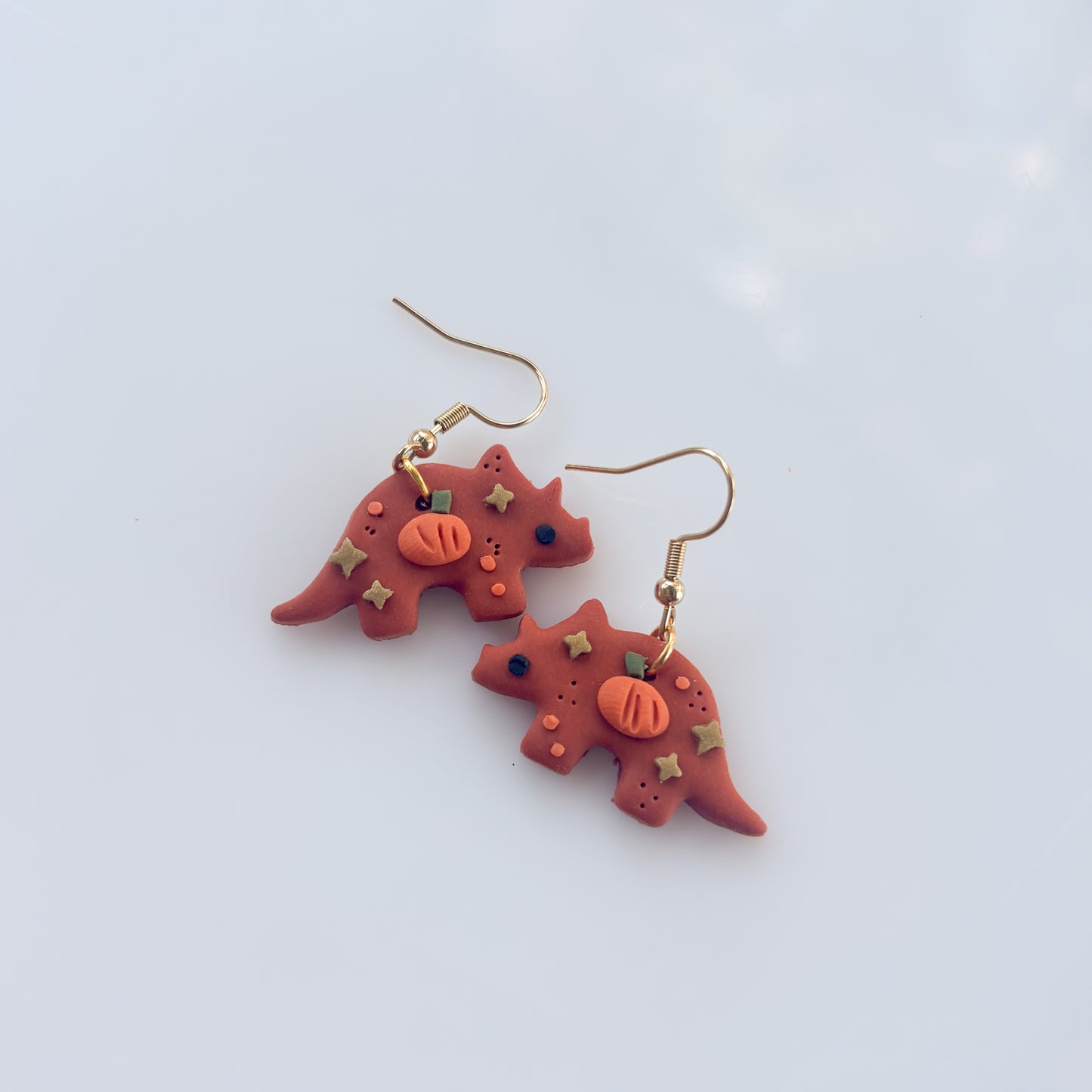 PUMPKIN TRICERATOPS EARRINGS