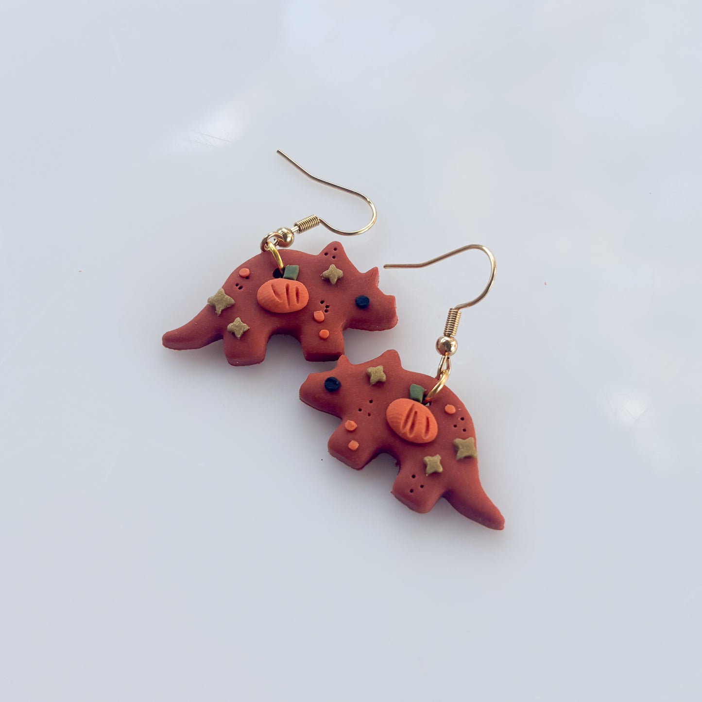 PUMPKIN TRICERATOPS EARRINGS