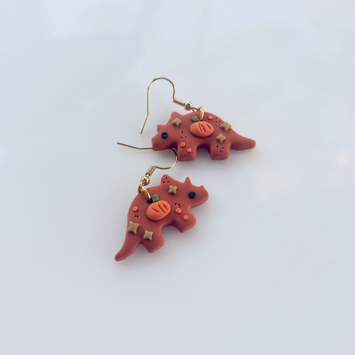 PUMPKIN TRICERATOPS EARRINGS