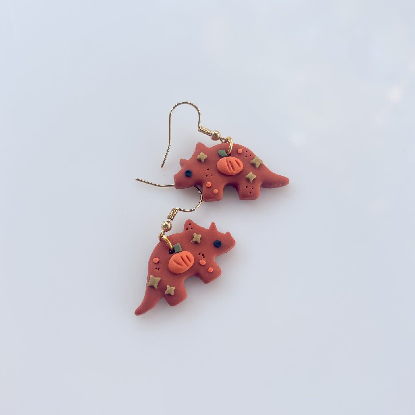 PUMPKIN TRICERATOPS EARRINGS