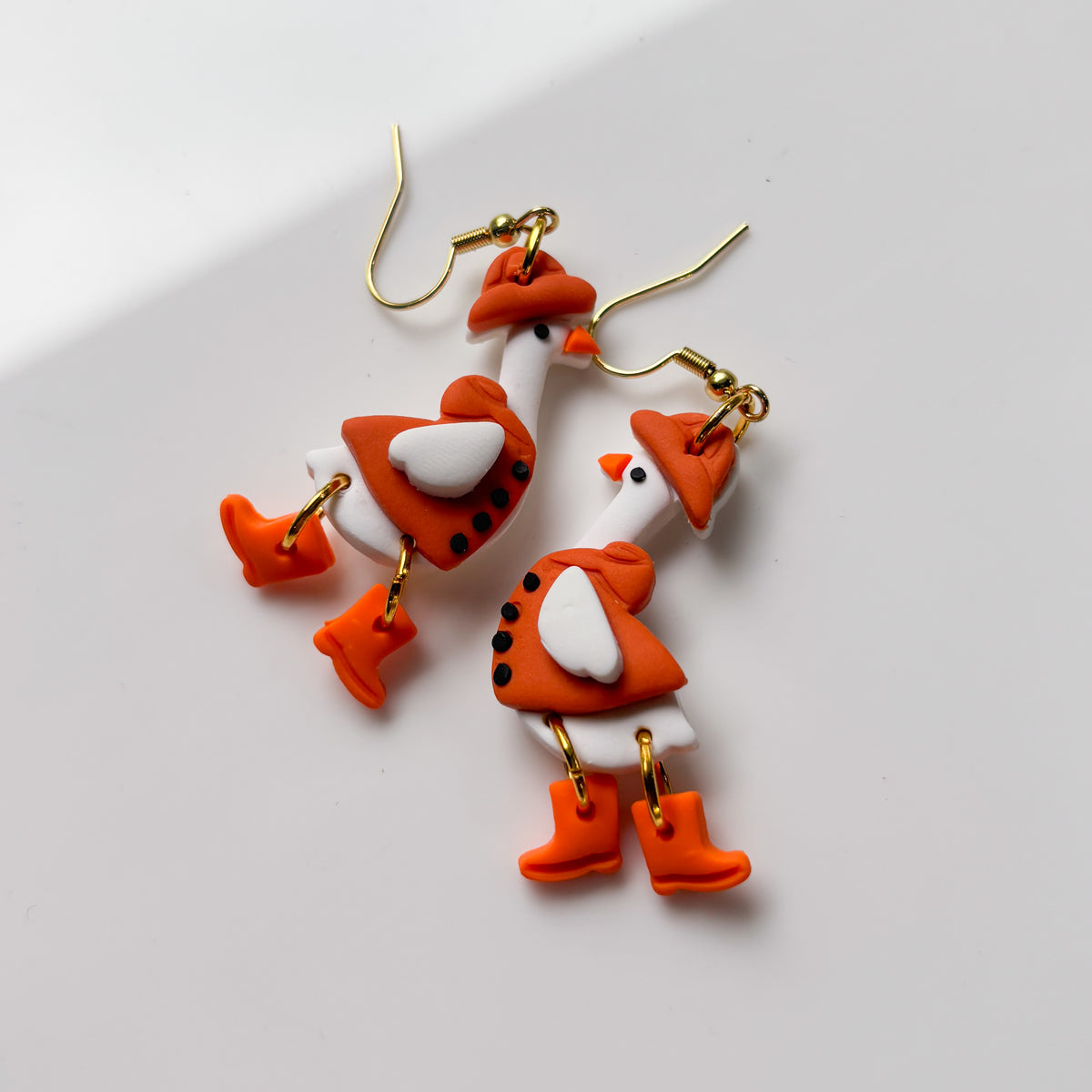 FALL GEESE IN RAINCOAT EARRINGS