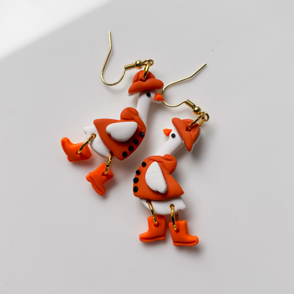 FALL GEESE IN RAINCOAT EARRINGS