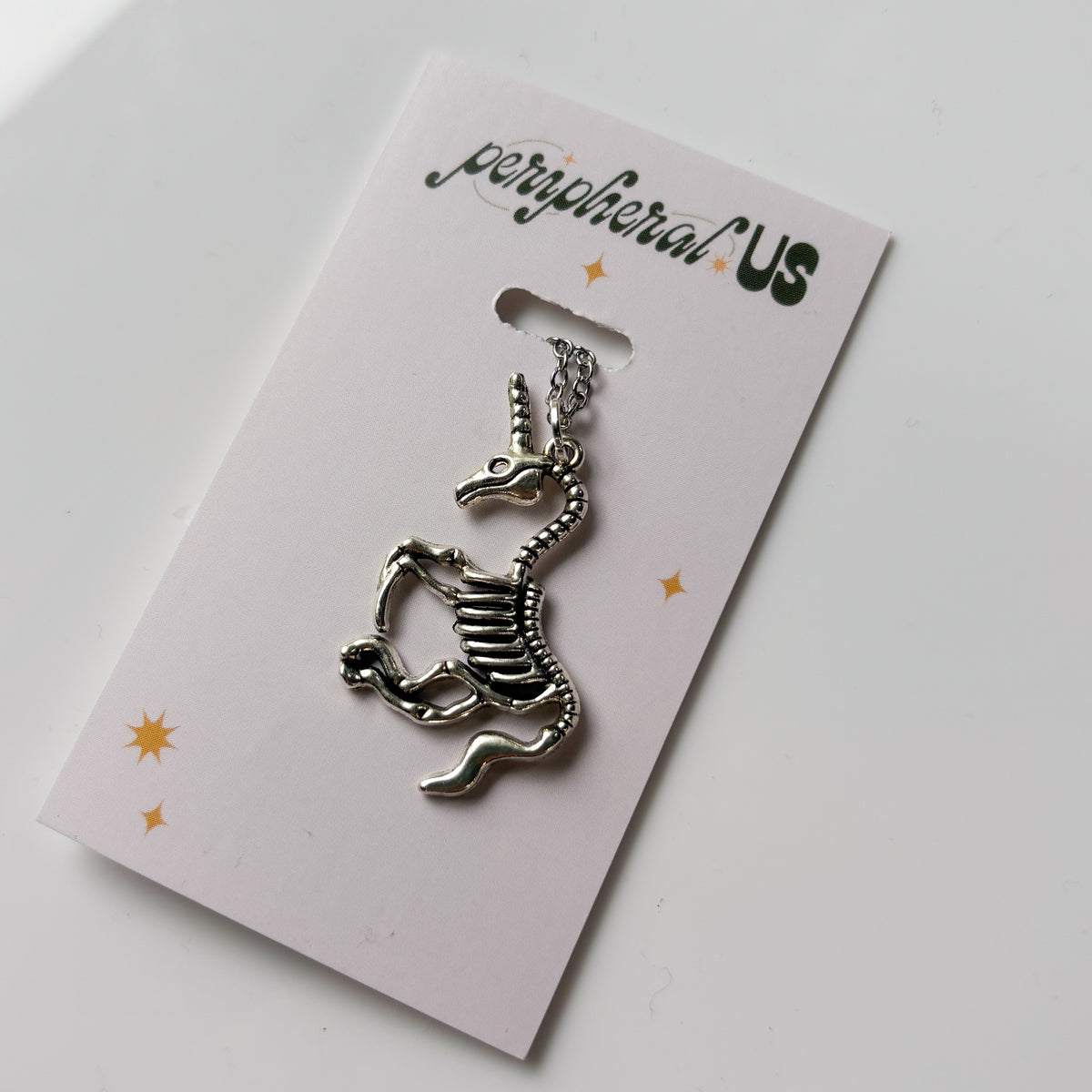 UNICORN SKELETON CHARM NECKLACE