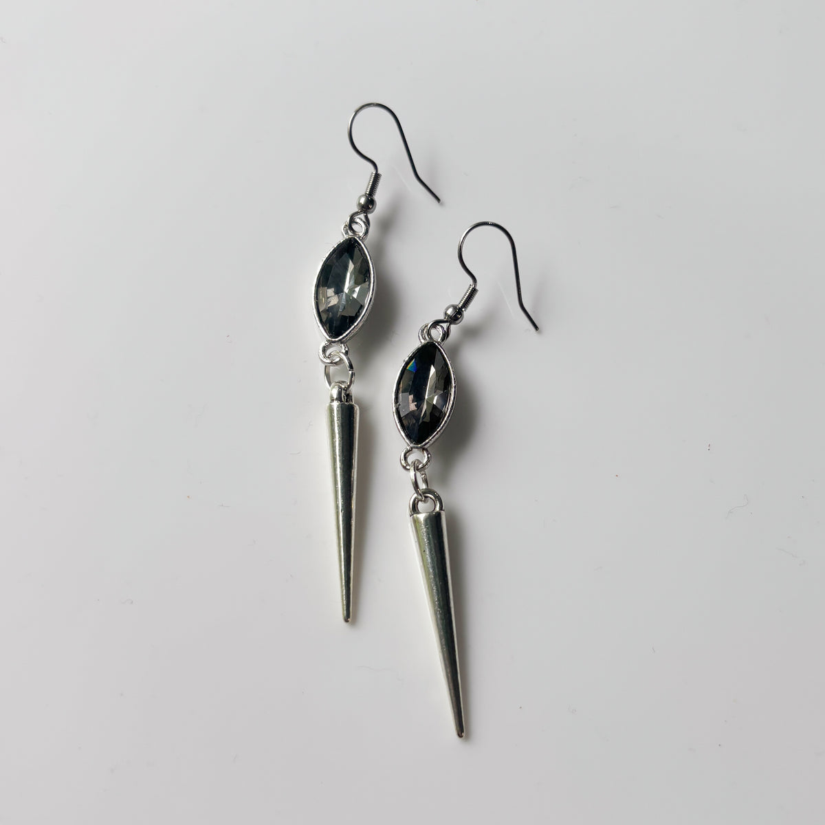 SMOKEY GREY OVAL SILVER SPIKE CHARM EARRINGS