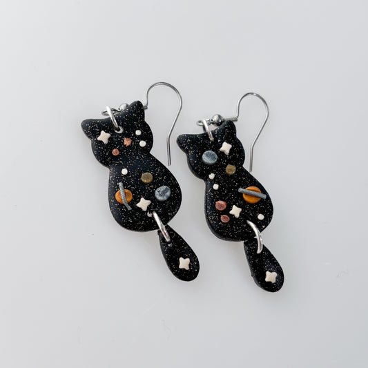 SPACE HANGING TAIL CAT EARRINGS