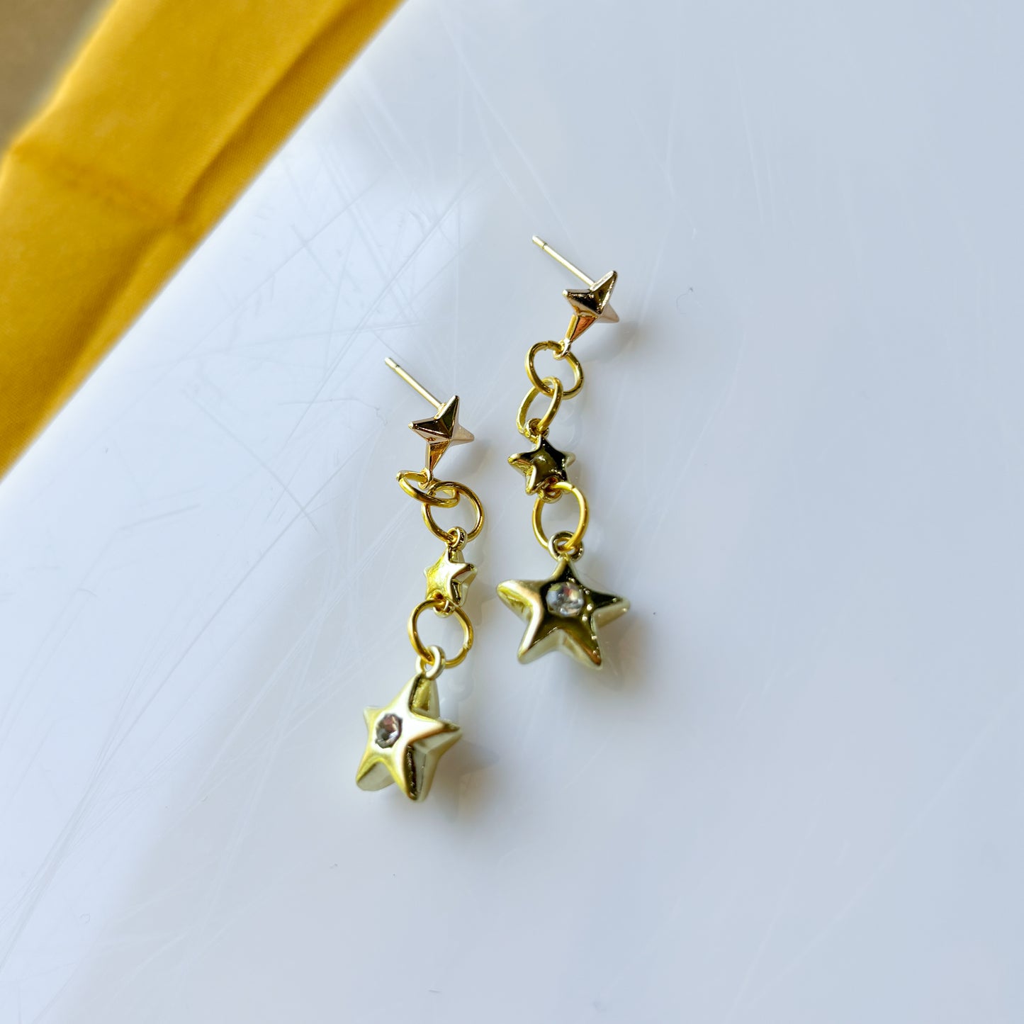 TRIPLE STAR STUD CHARM EARRINGS