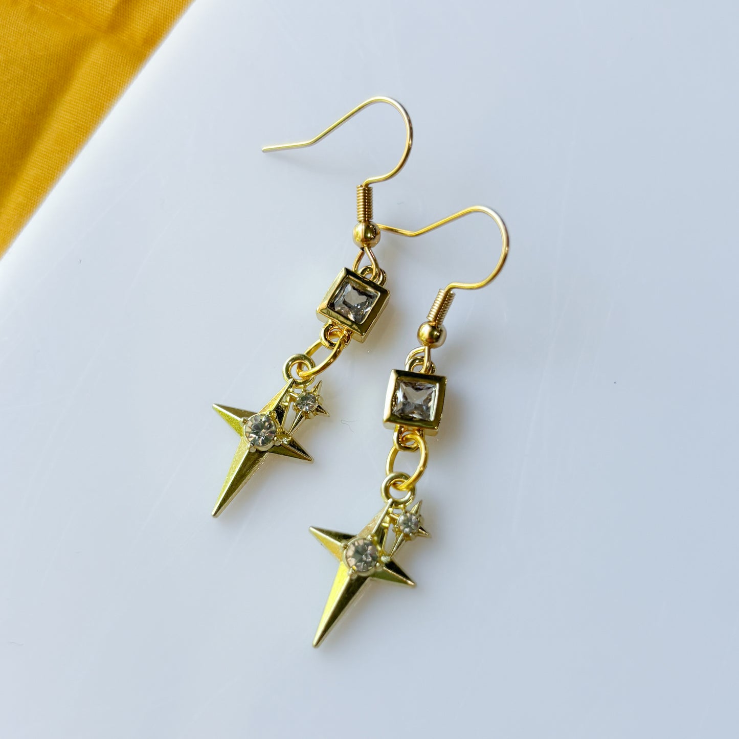 SQUARE CRYSTAL & DOUBLED STAR GOLD CHARM EARRINGS