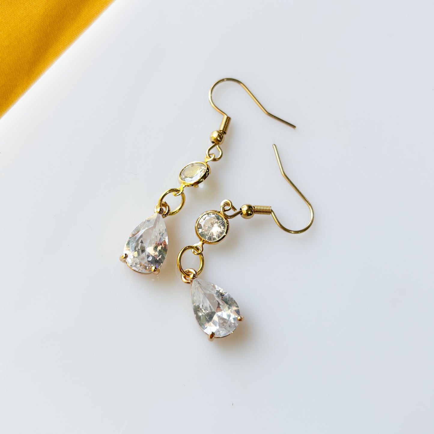 GOLD CRYSTAL TEARDROP CHARM EARRINGS