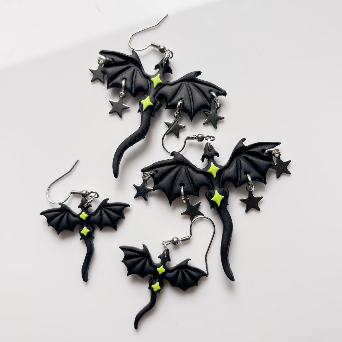 BLACK AND GREEN STAR DRAGONS