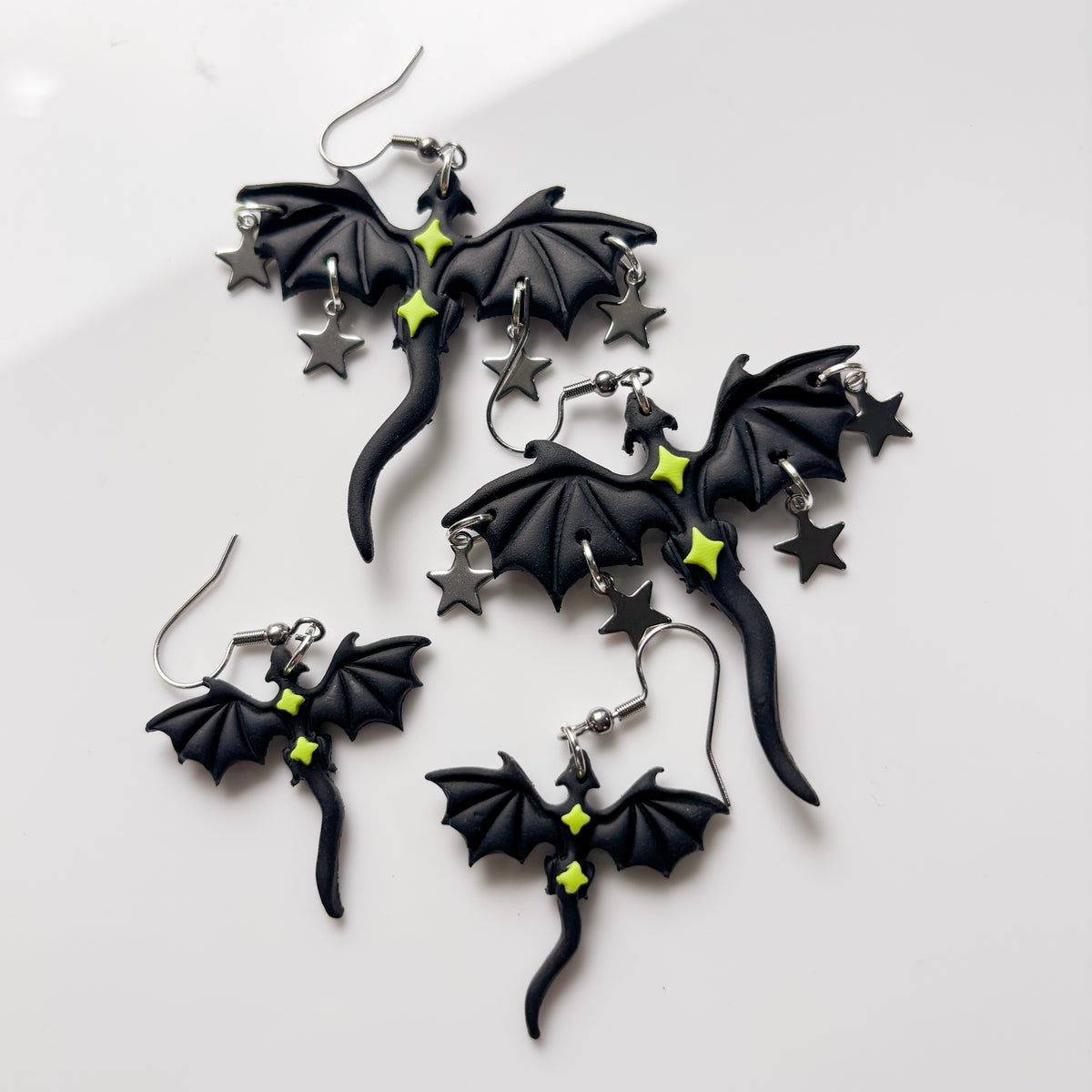 BLACK AND GREEN STAR DRAGONS