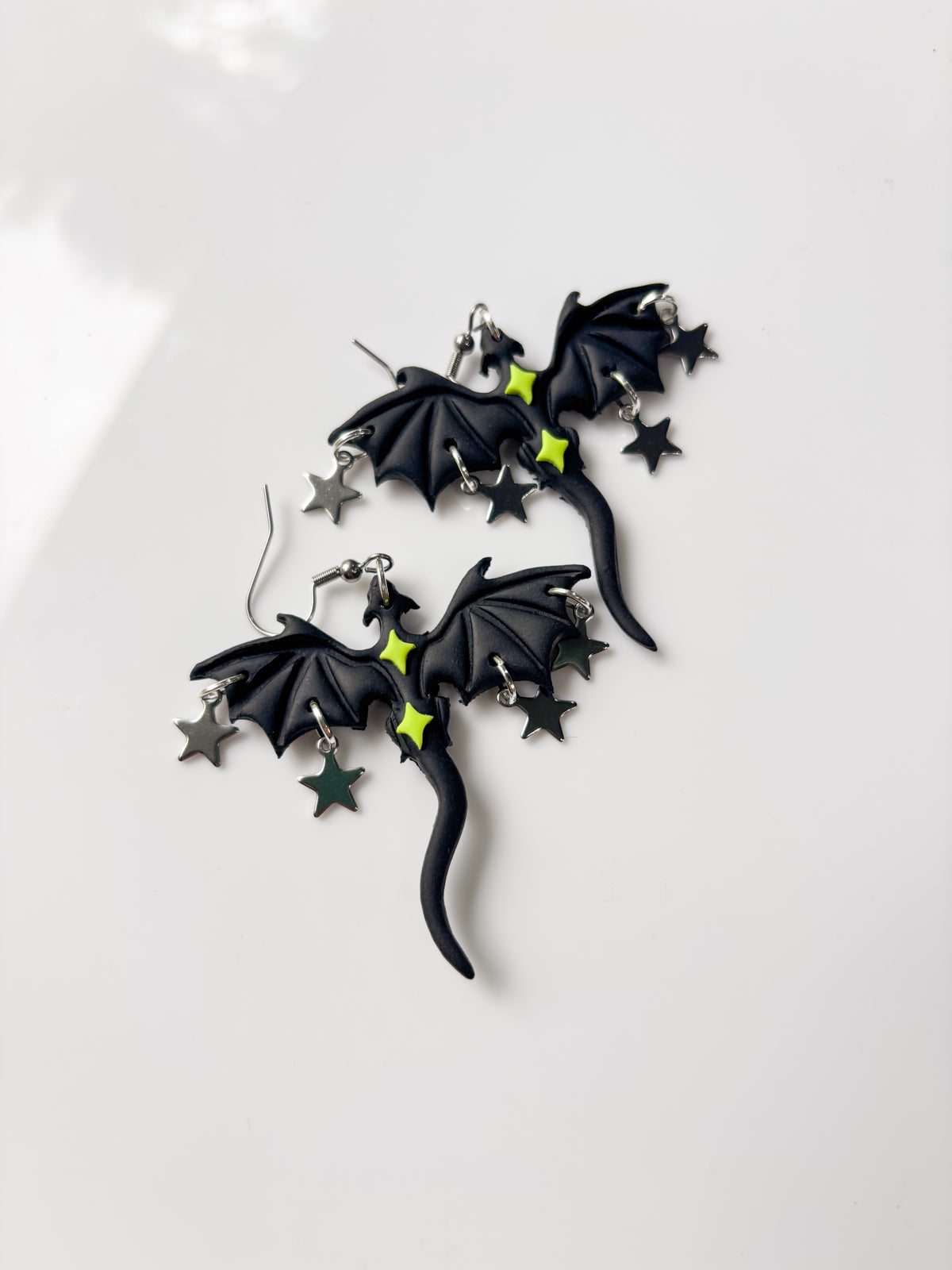 BLACK AND GREEN STAR DRAGONS