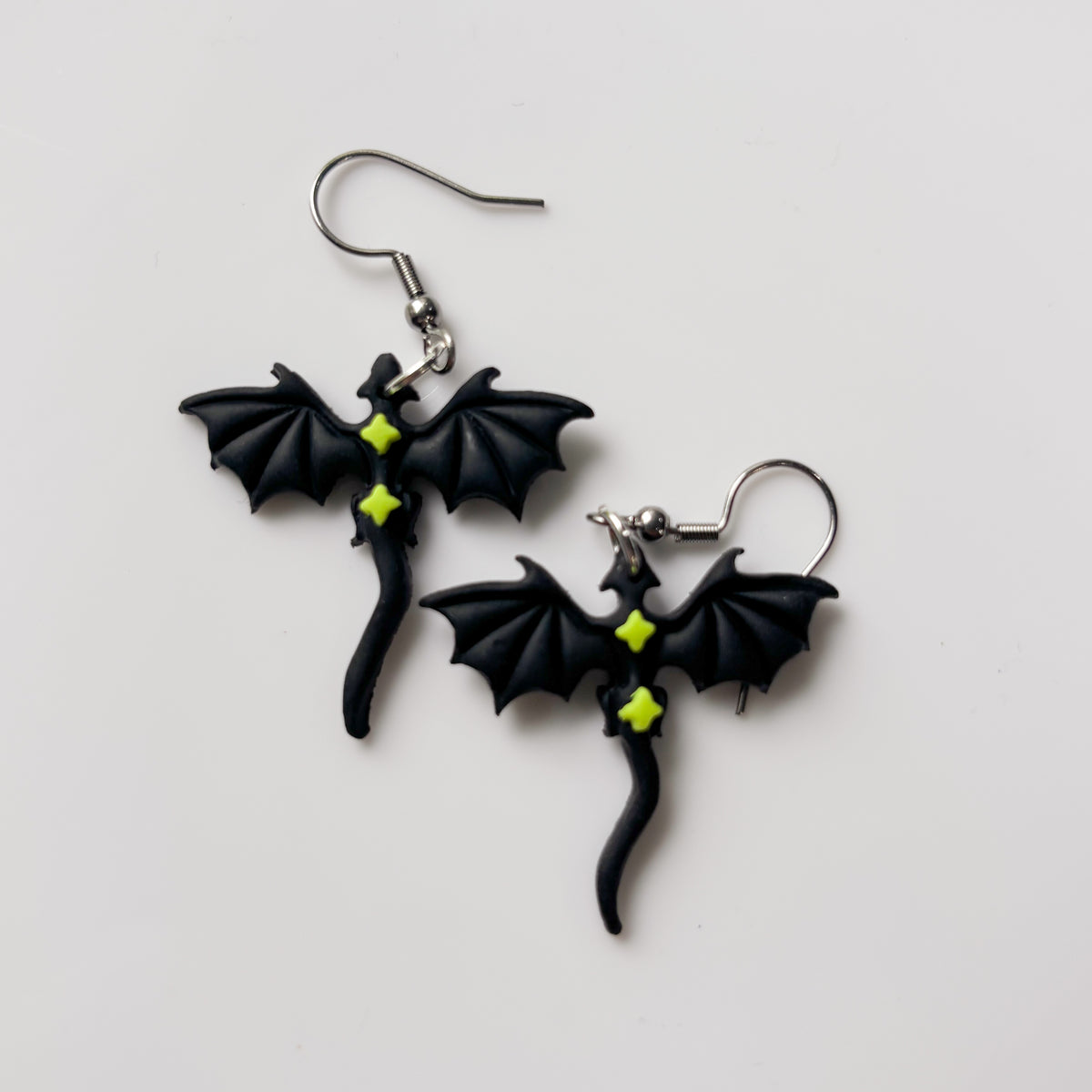BLACK AND GREEN STAR DRAGONS