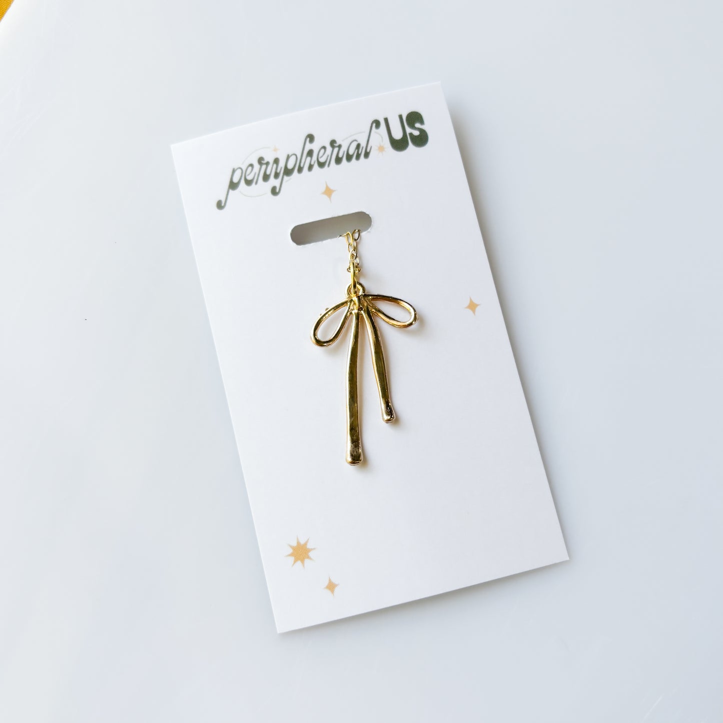 BOW CHARM NECKLACE