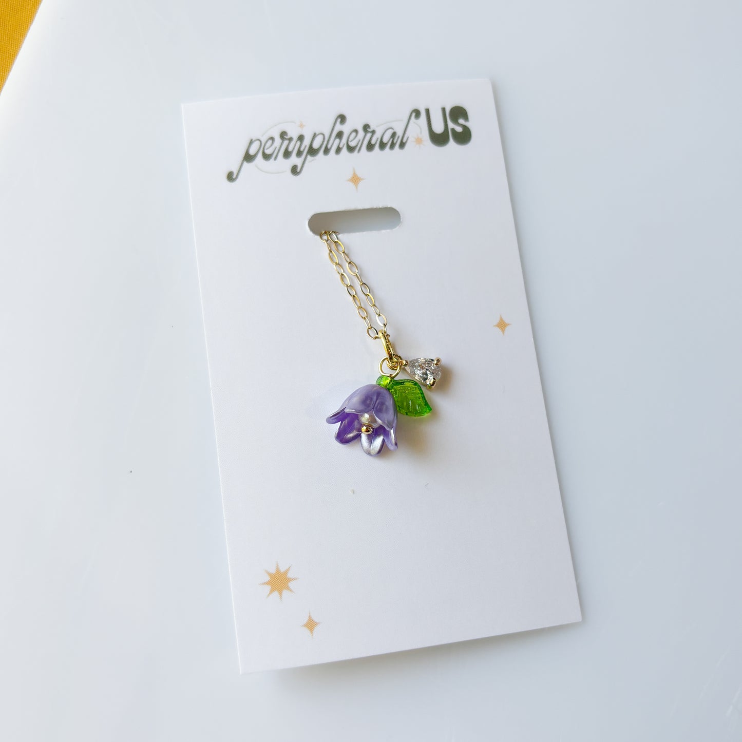 PURPLE FLOWER CHARM NECKLACE