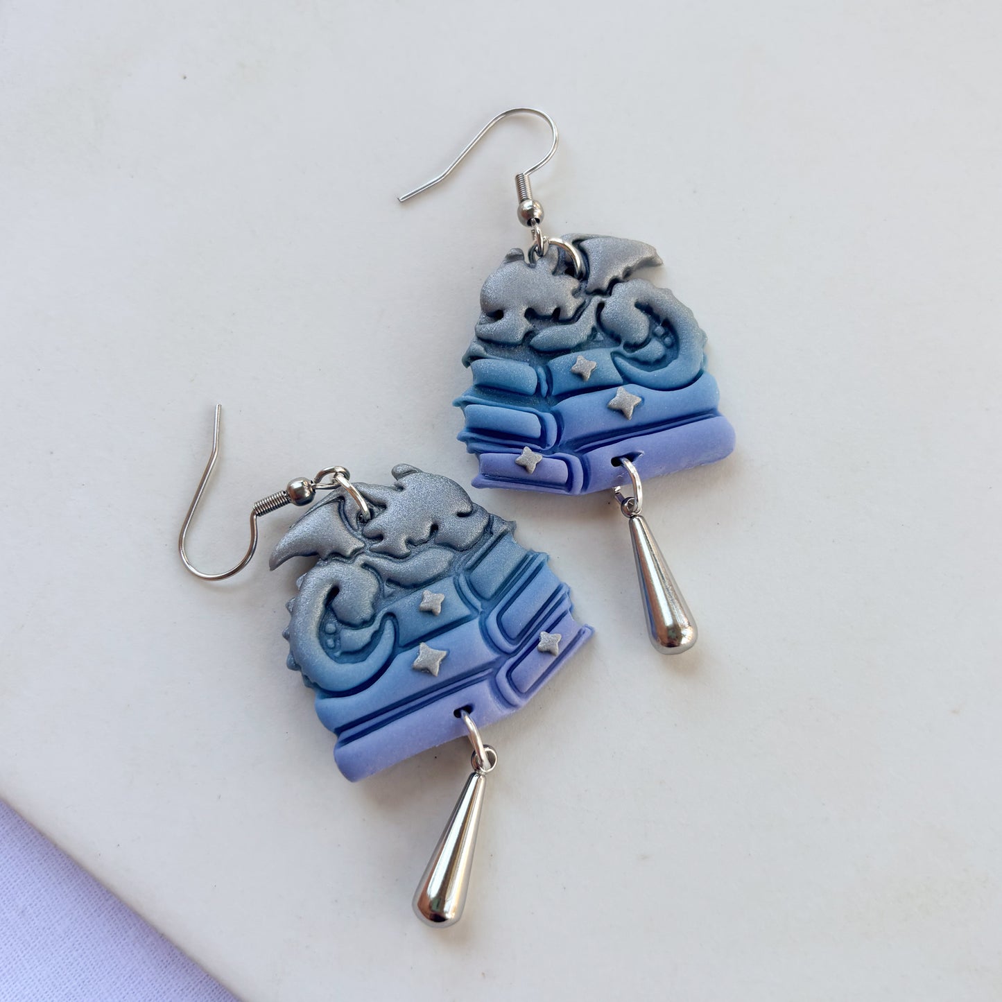 DRAGON ON BOOKS EARRINGS (SILVER BLUE PERIWINKLE)