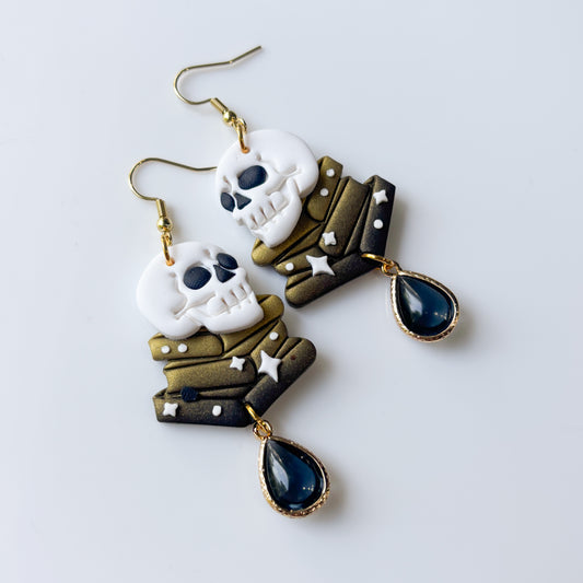 SKULLS ON BOOKS EARRINGS