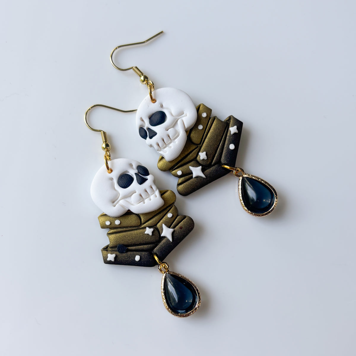 SKULLS ON BOOKS EARRINGS