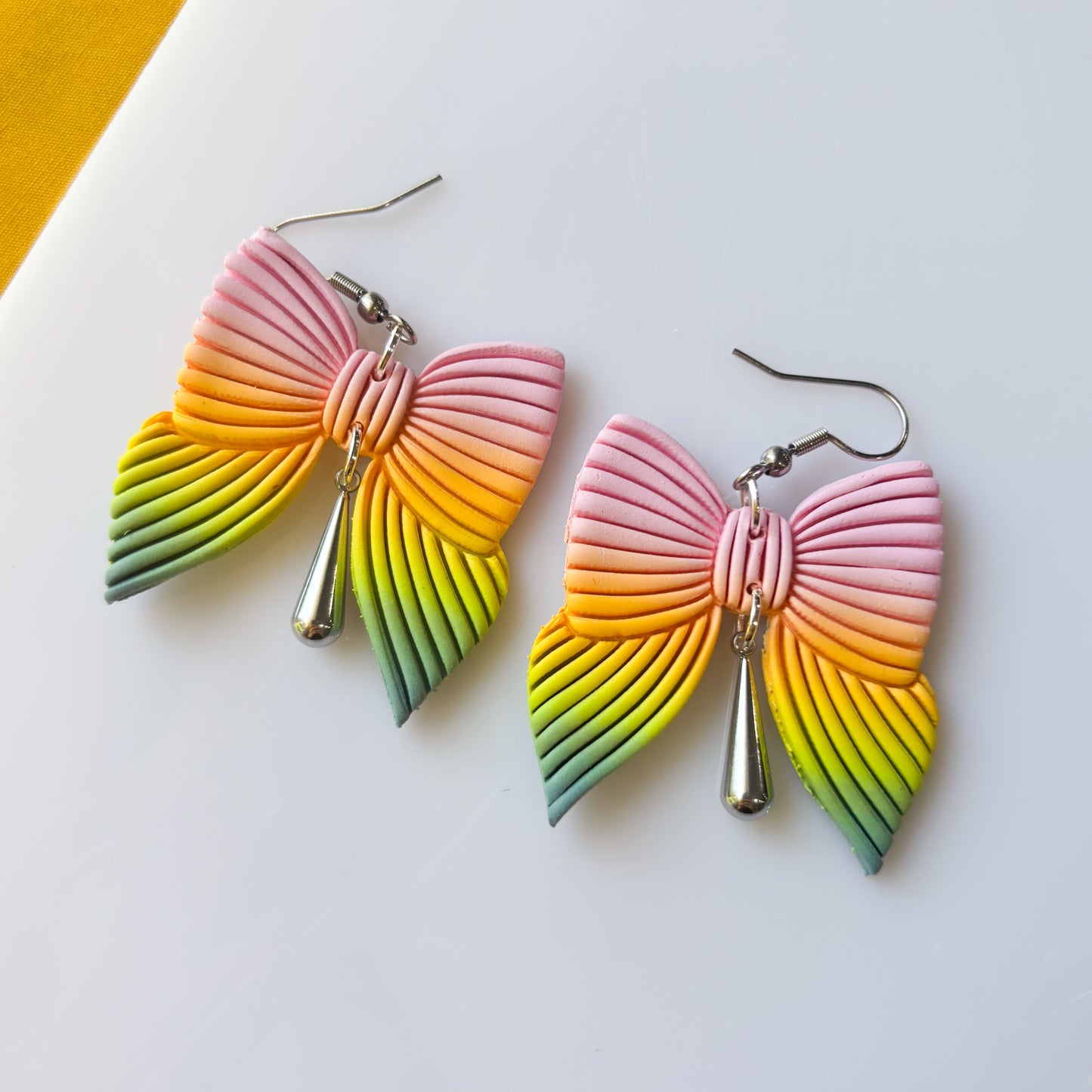 PASTEL RAINBOW BOW EARRINGS
