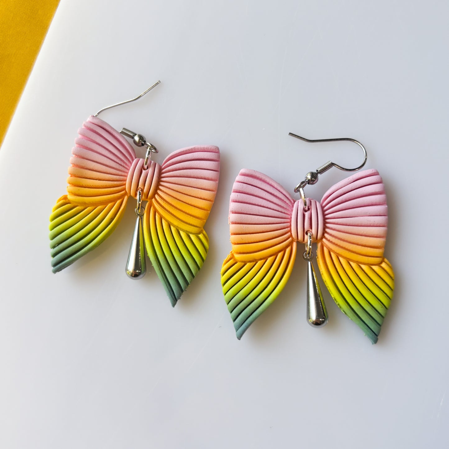 PASTEL RAINBOW BOW EARRINGS