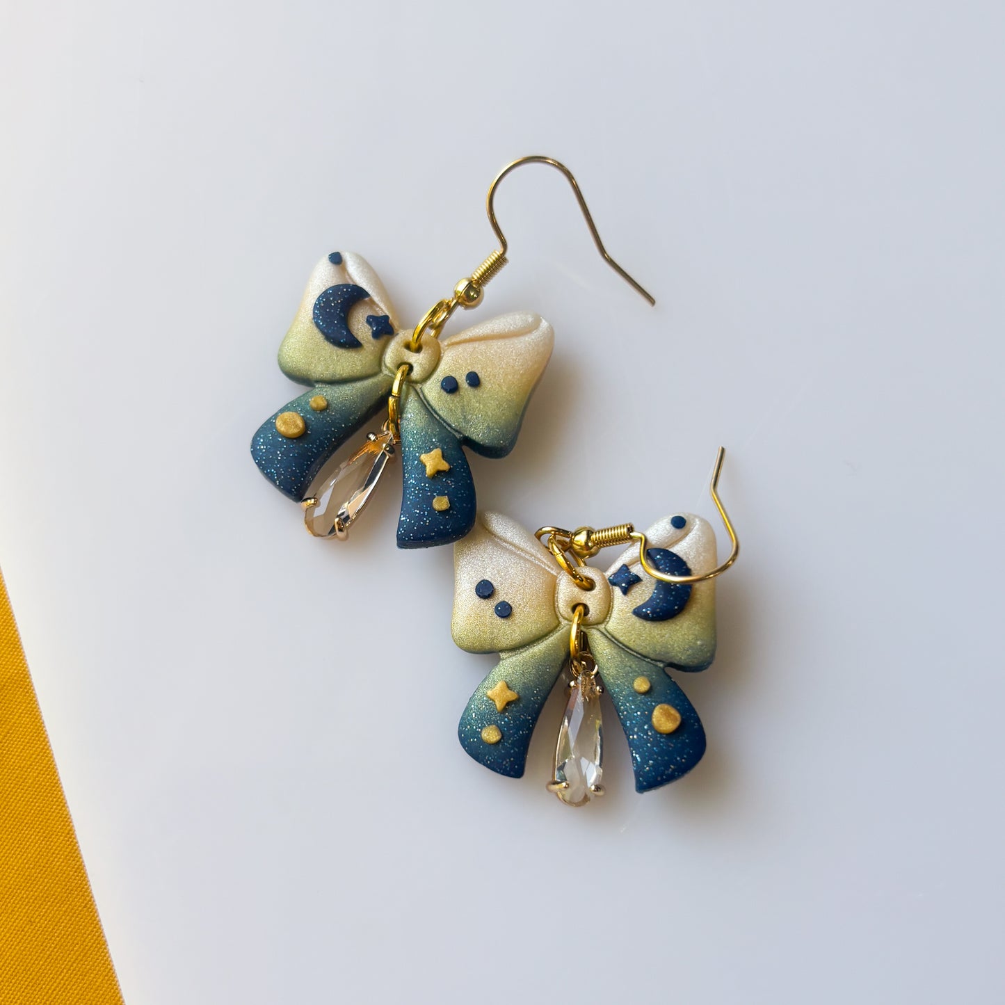 STARRY BOW EARRINGS