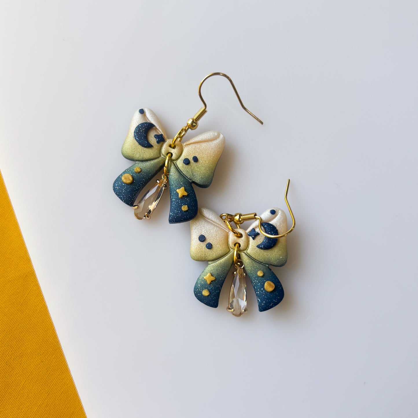 STARRY BOW EARRINGS