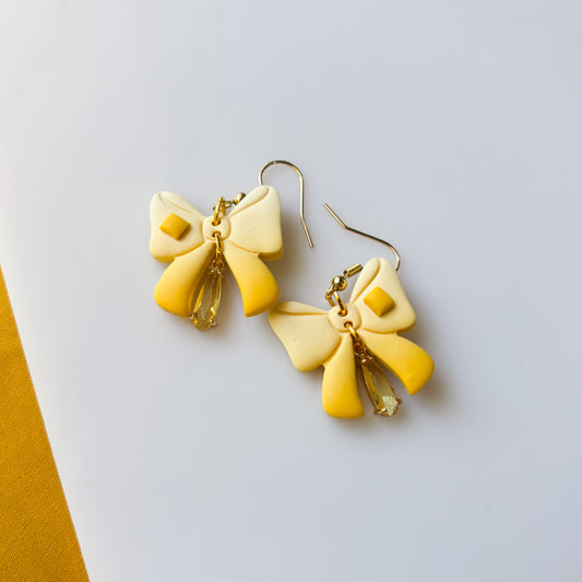 BUTTER BOW EARRINGS