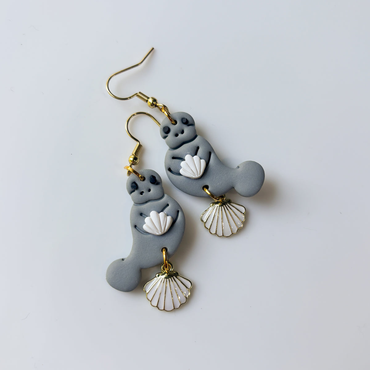 MANATEES (WITH WHITE SHELLS) EARRINGS