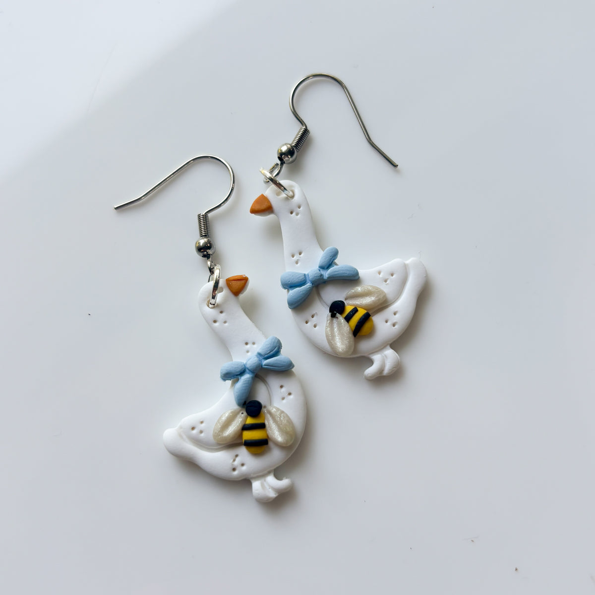 BEE BLUE BOW GEESE EARRINGS