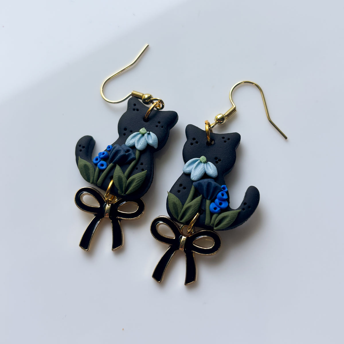 BLACK FLORAL CAT EARRINGS