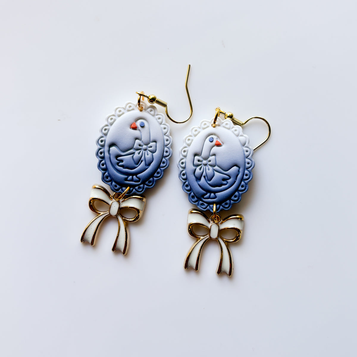 SILLY GOOSE FRAME EARRINGS