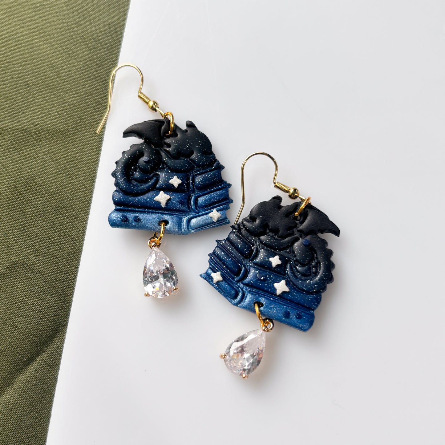 STARRY BLUE DRAGONS ON BOOKS EARRINGS