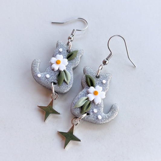 SILVER GLITTER DAISY CAT EARRINGS