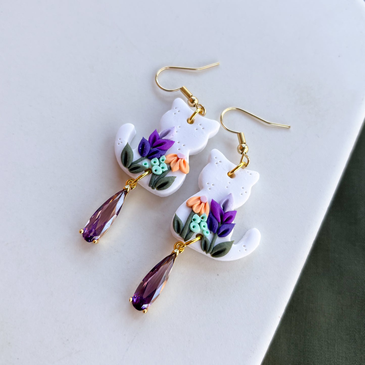 WHITE FLORAL CAT EARRINGS