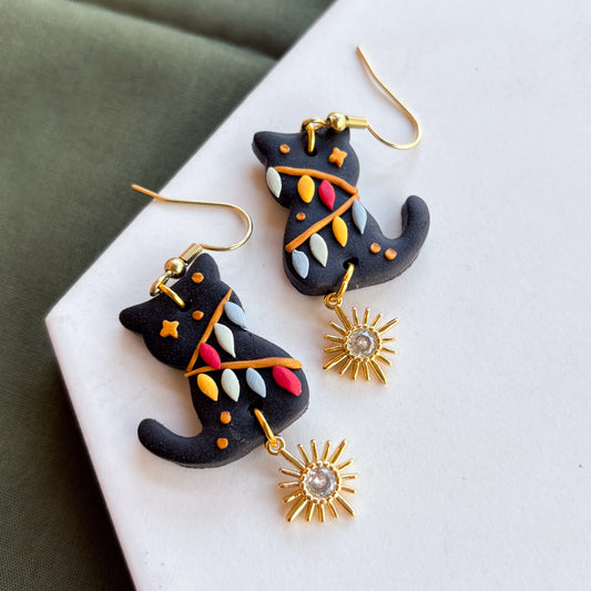 BLACK CHRISTMAS LIGHT CAT EARRINGS