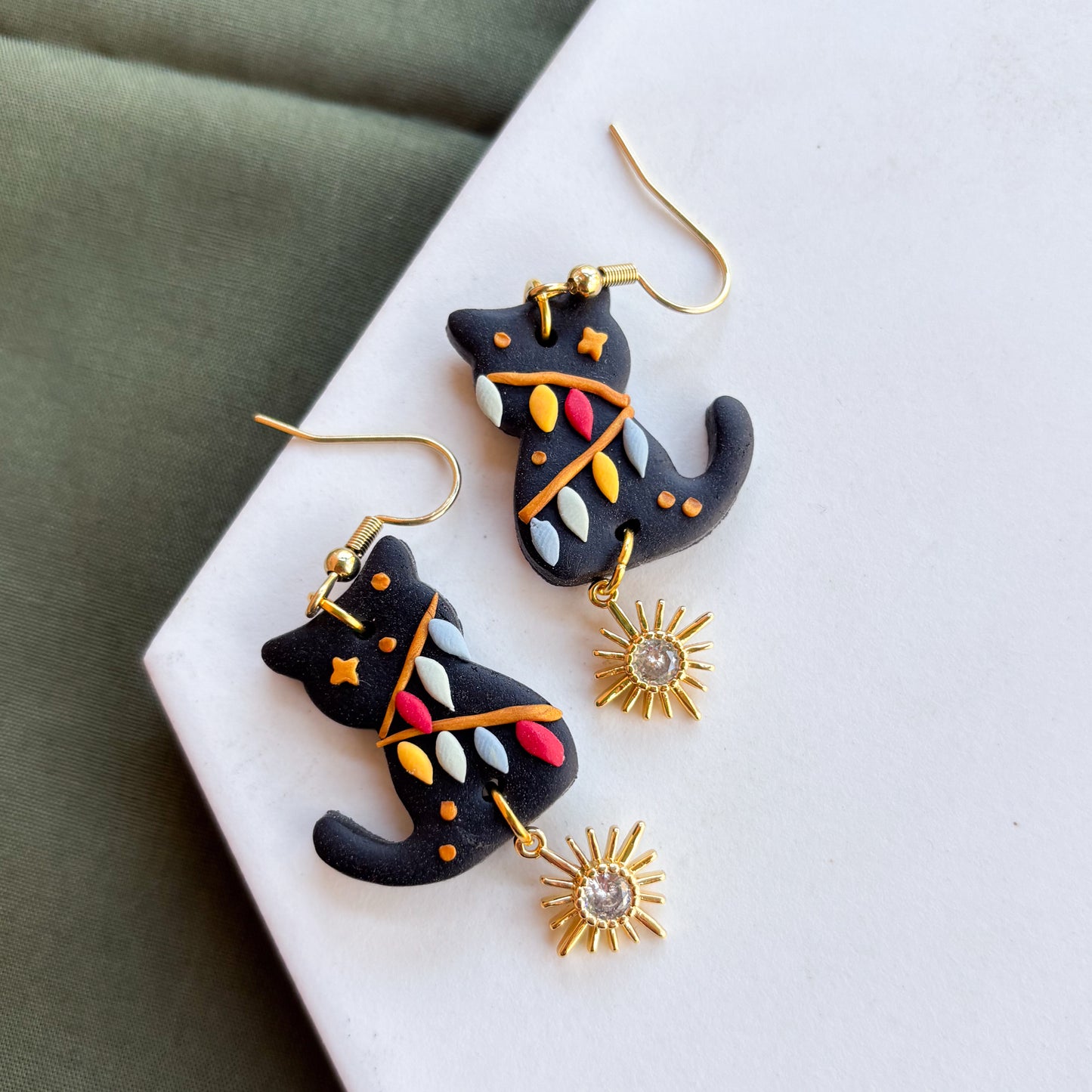 BLACK CHRISTMAS LIGHT CAT EARRINGS