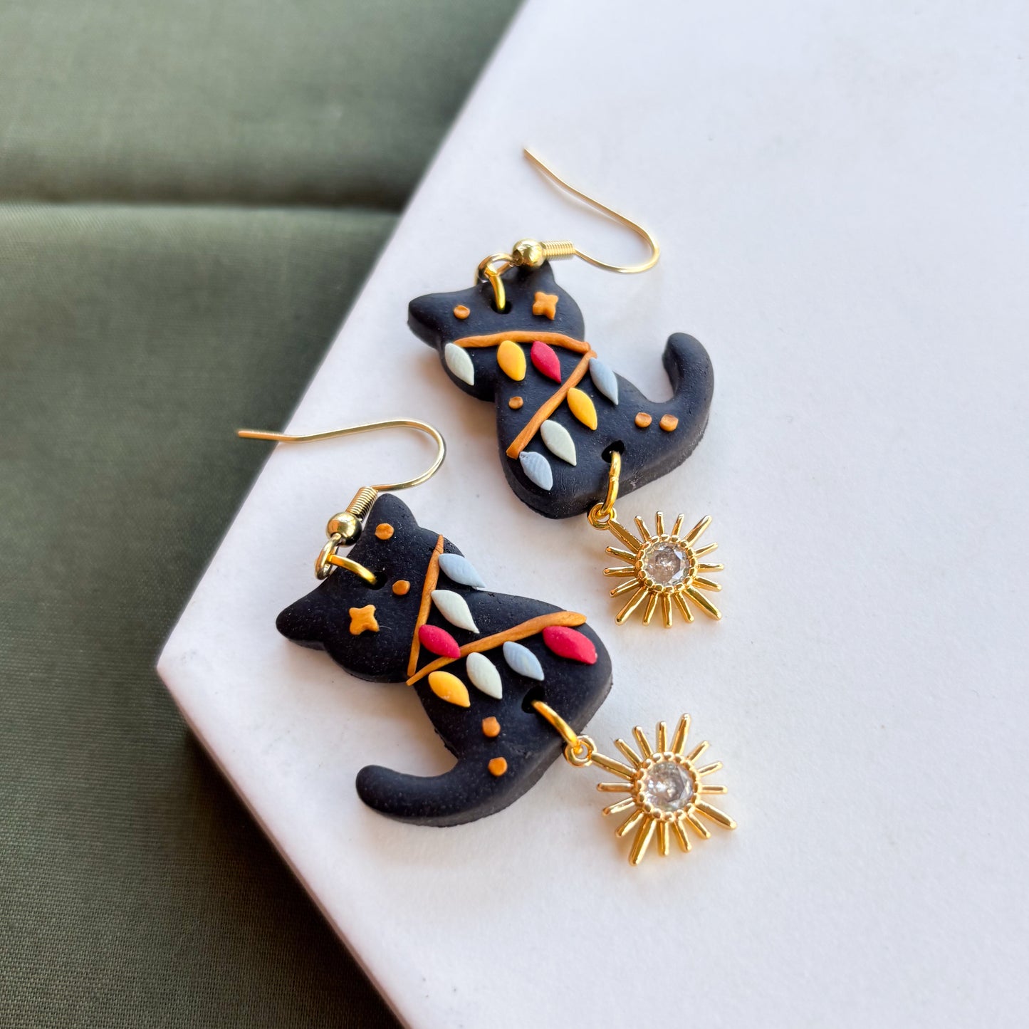 BLACK CHRISTMAS LIGHT CAT EARRINGS