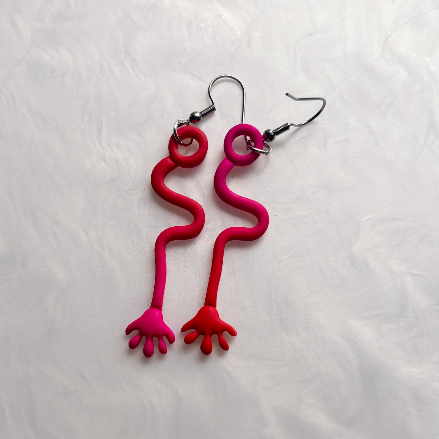 PINK/RED STICKY HAND EARRINGS