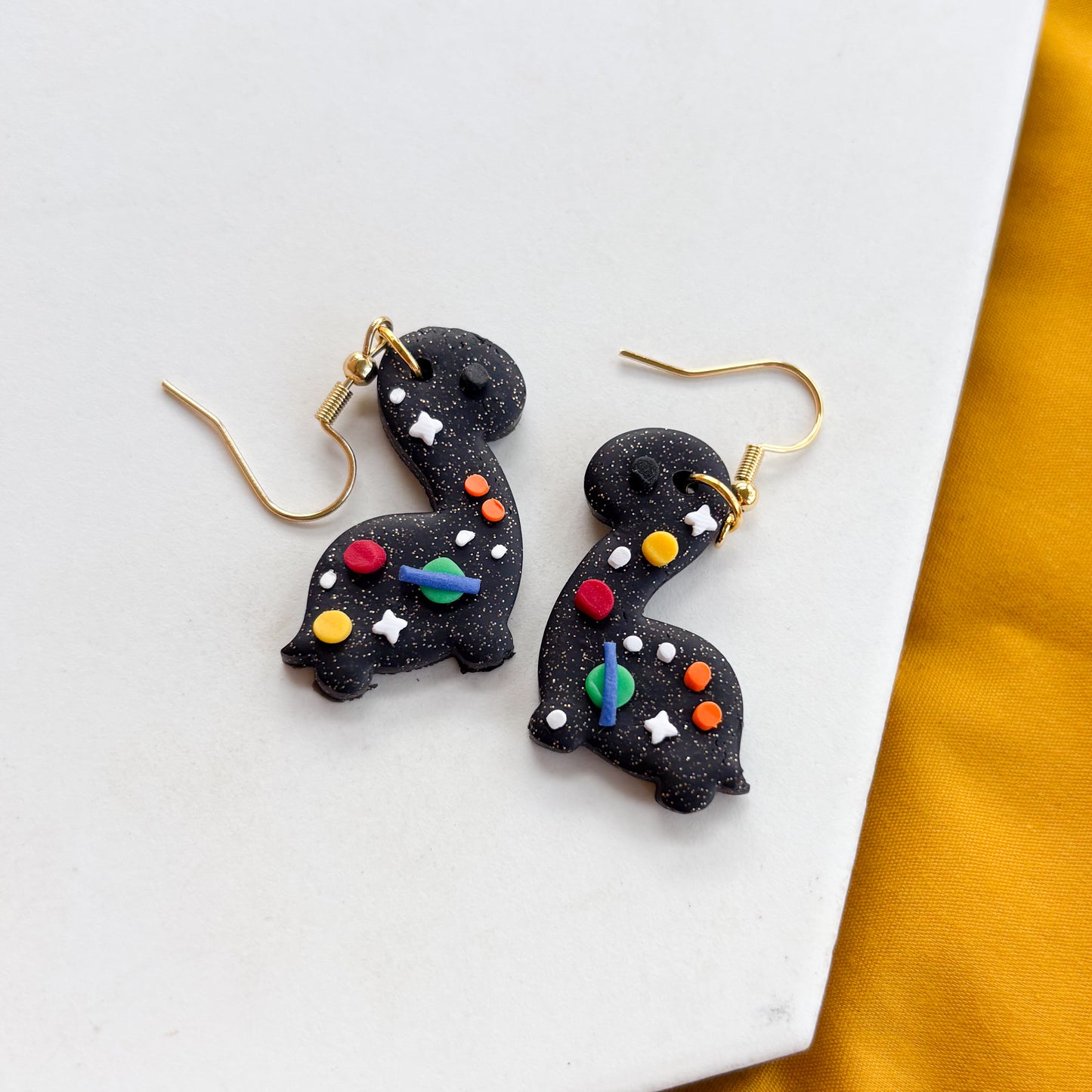 SPACE DINO EARRINGS