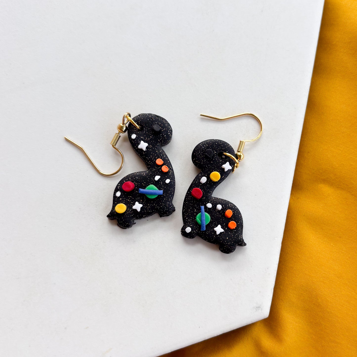 SPACE DINO EARRINGS