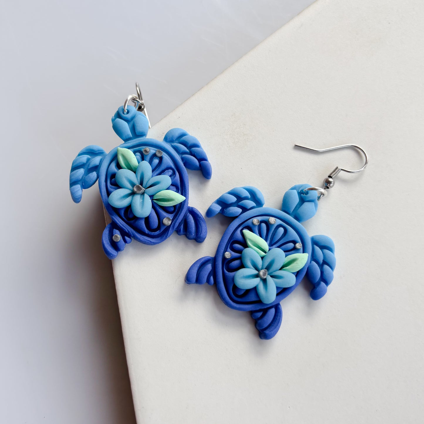BLUE FLOWER TURTLE EARRINGS