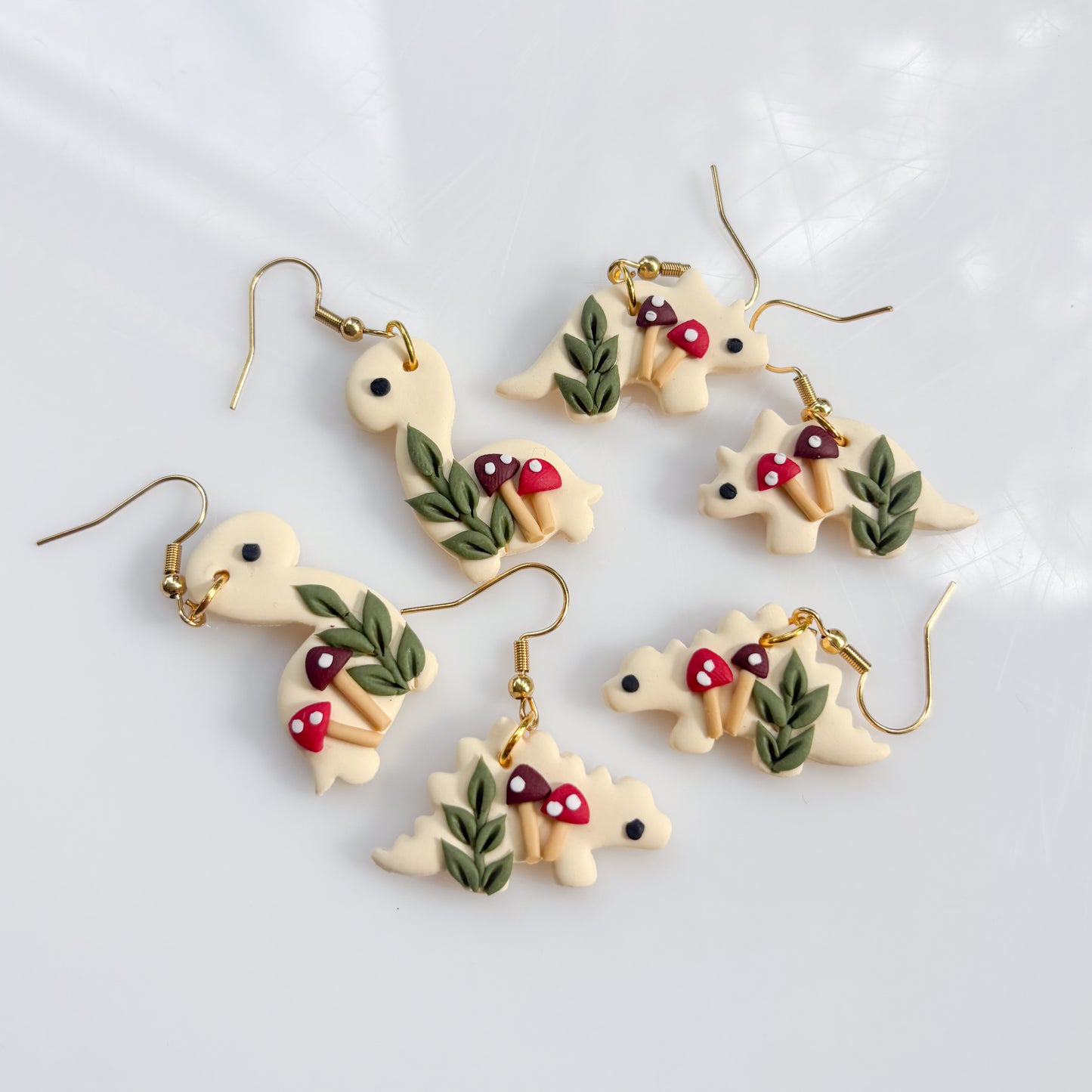 IVORY MUSHROOM DINO EARRINGS (BRONTO)