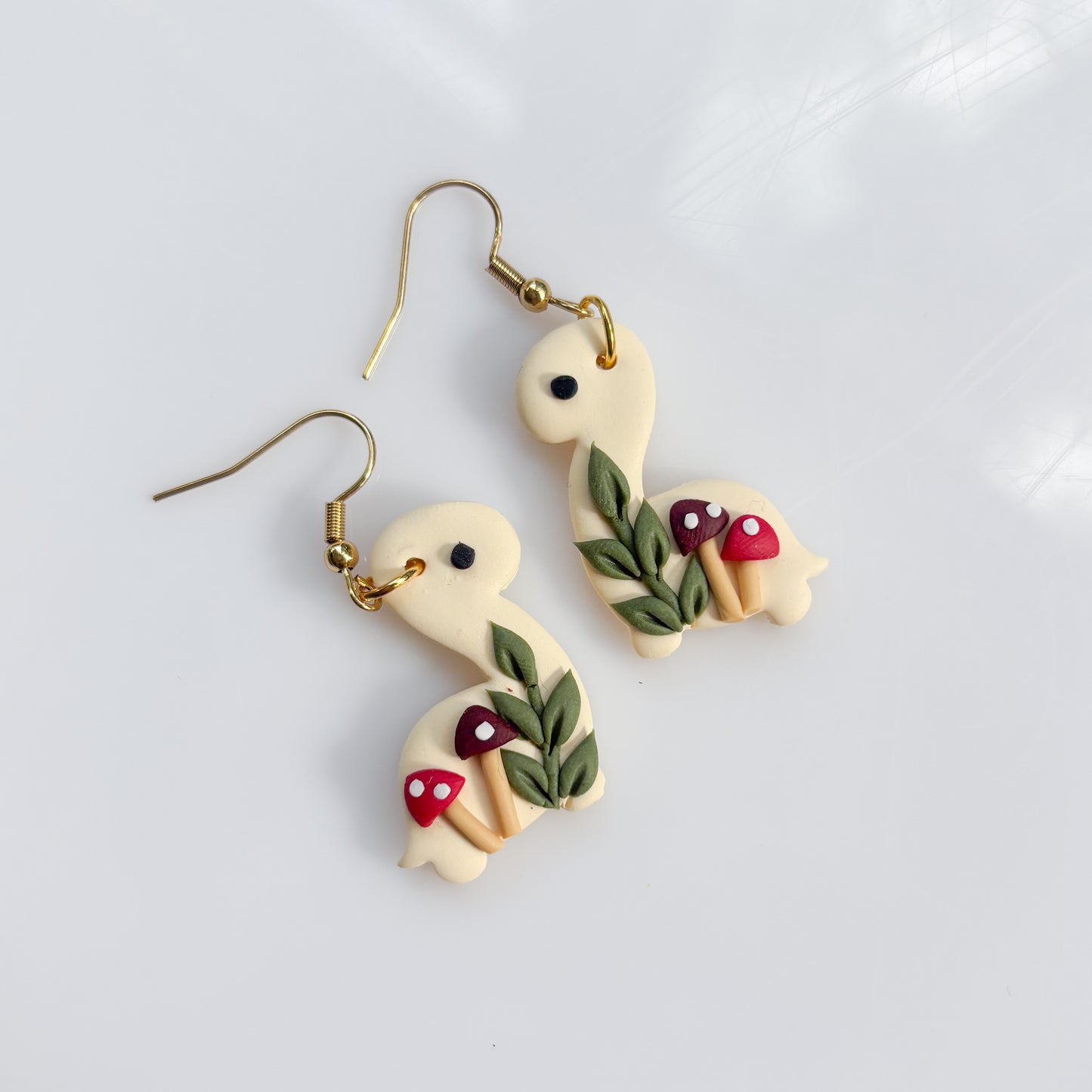 IVORY MUSHROOM DINO EARRINGS (BRONTO)