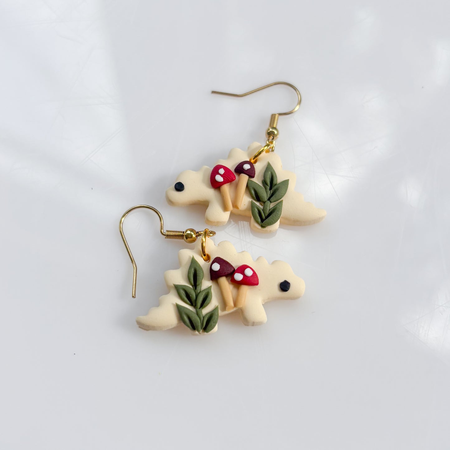 IVORY MUSHROOM DINO EARRINGS (STEGO)