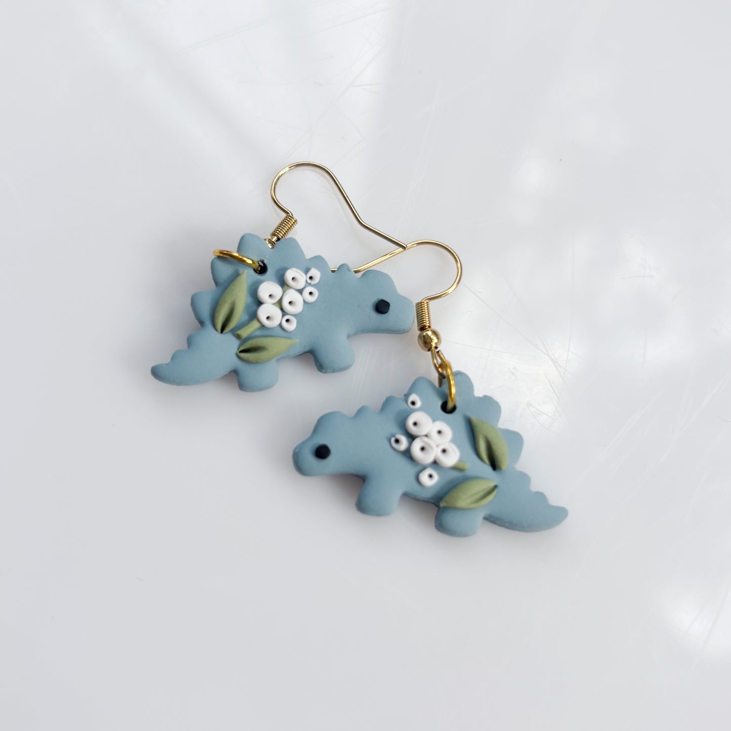 BLUE BABYS BREATH DINO EARRINGS (STEGO)