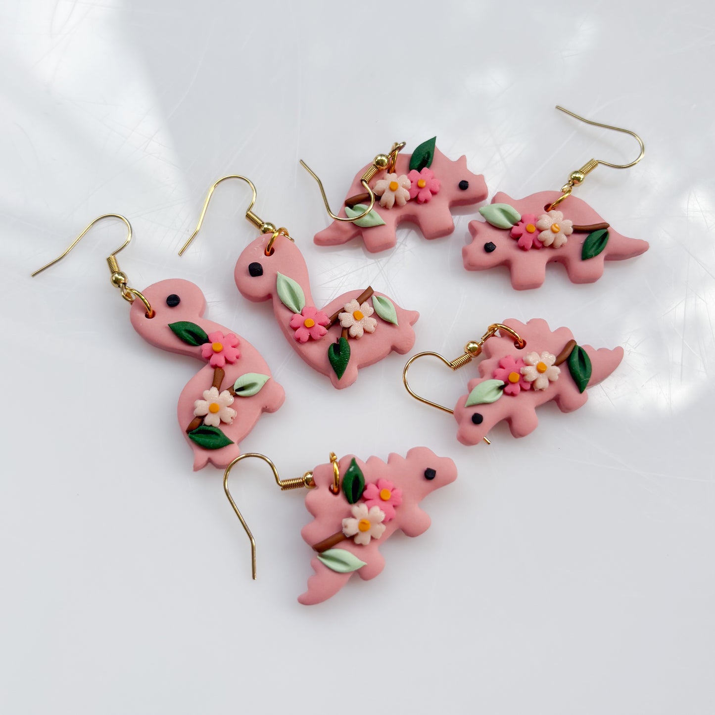 CHERRY BLOSSOM DINO EARRINGS (STEGO)
